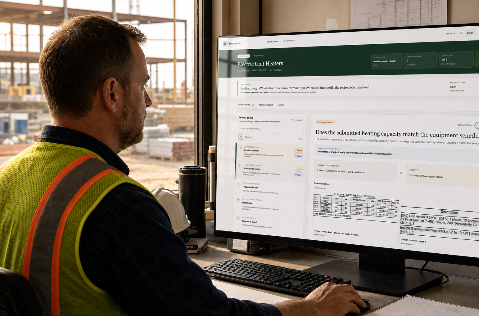 Construction professional reviewing Humance on a monitor
